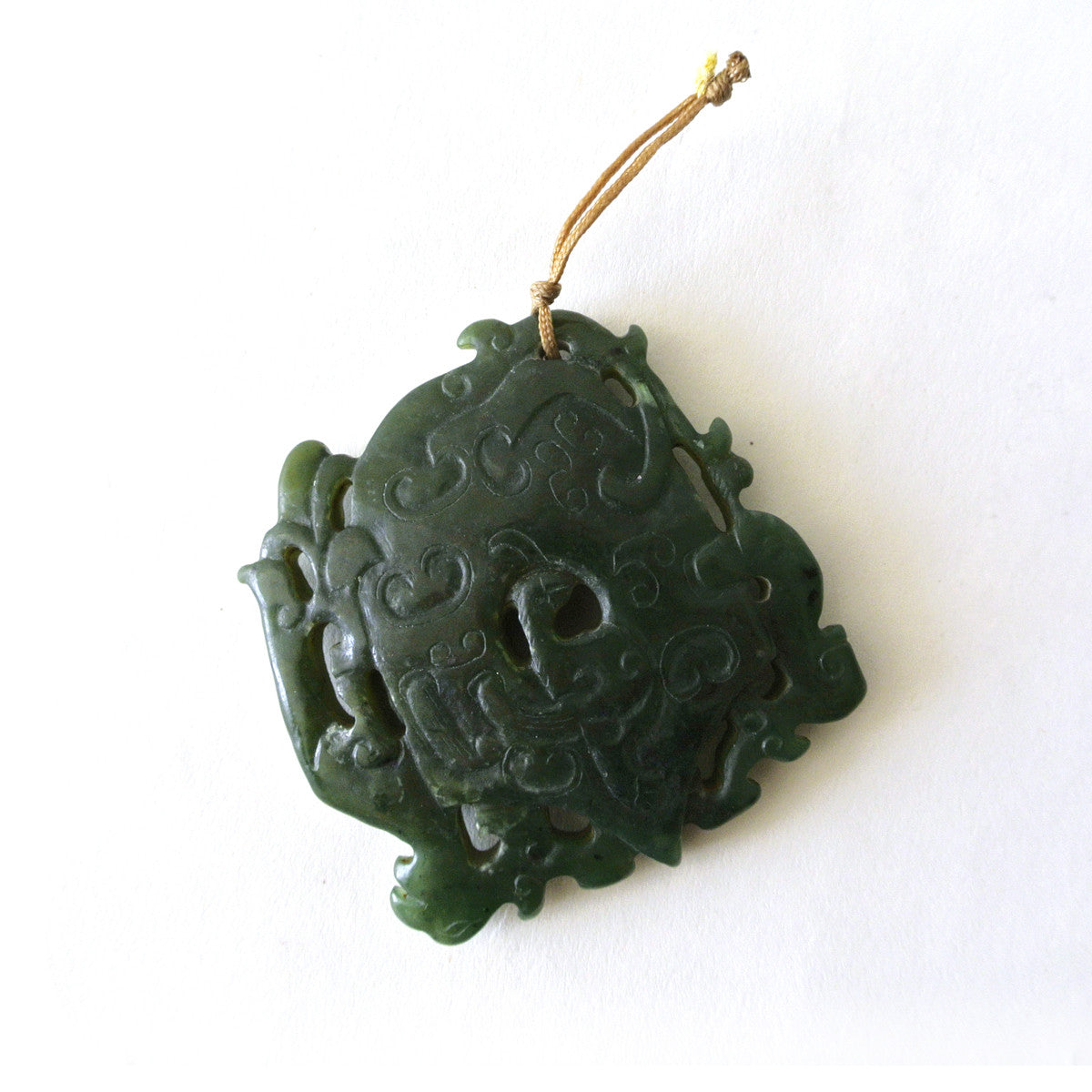 Chinese Spinach Green Jade Pendant with Intricate Archaic Design